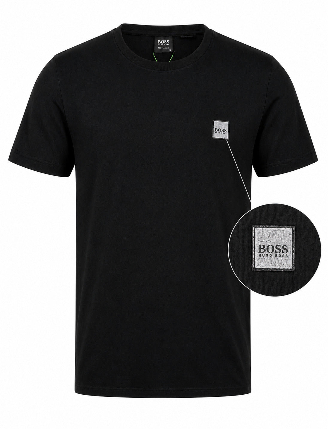A black short-sleeve crewneck t-shirt by Hugo Boss, featuring a small silver-toned square logo patch on the left chest. A circular inset on the right provides a close-up view of the logo patch.