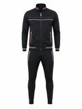 A black two-piece tracksuit featuring a zip-up jacket and matching pants, both decorated with red and white stripe accents on the collar, cuffs, hem, and pockets, shown against a plain white background.