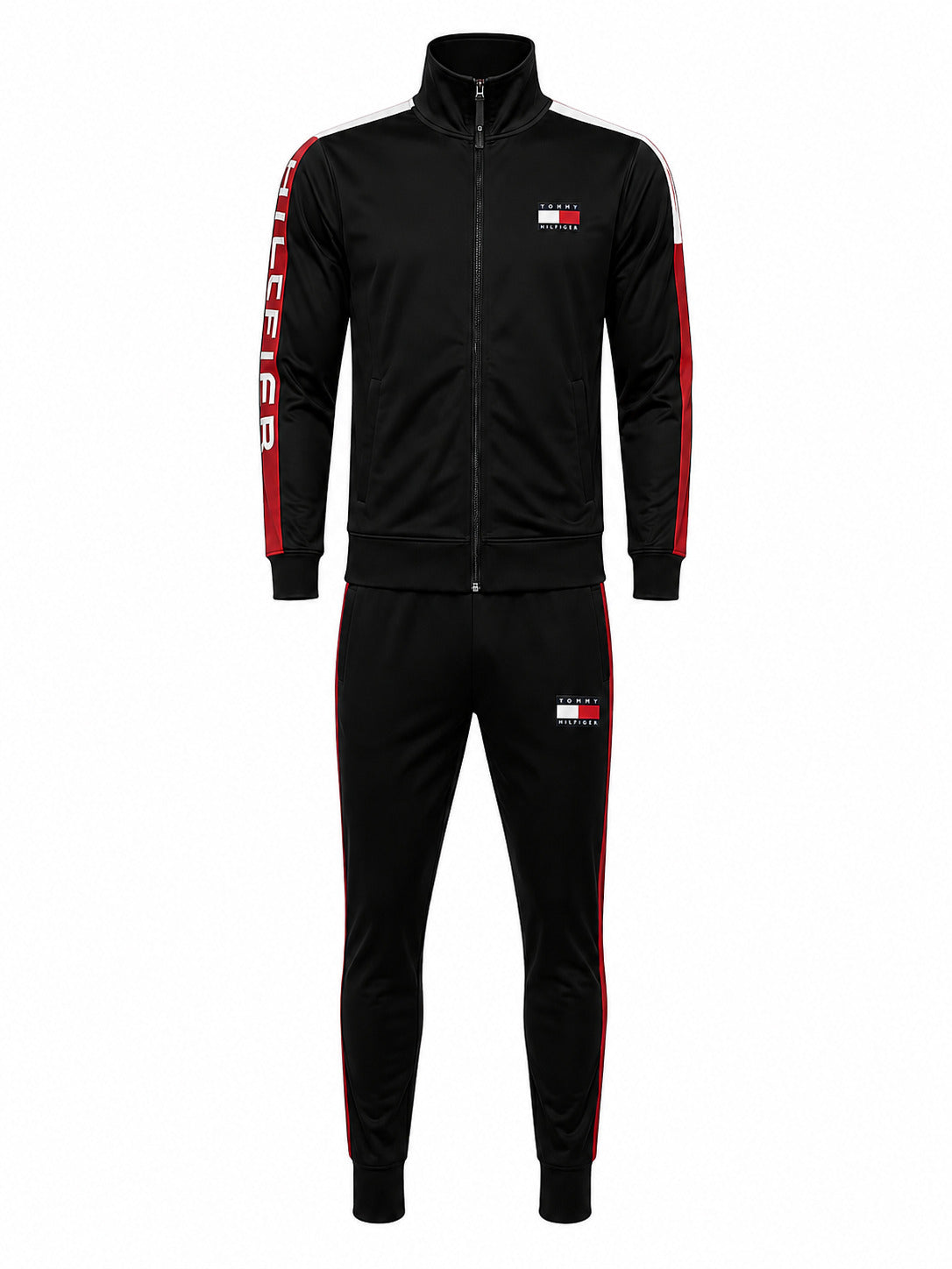 A black Tommy Hilfiger track jacket and matching track pants set, featuring red and white side stripes, a red and white vertical logo on the sleeve, and a Tommy Hilfiger flag logo on the chest and thigh.