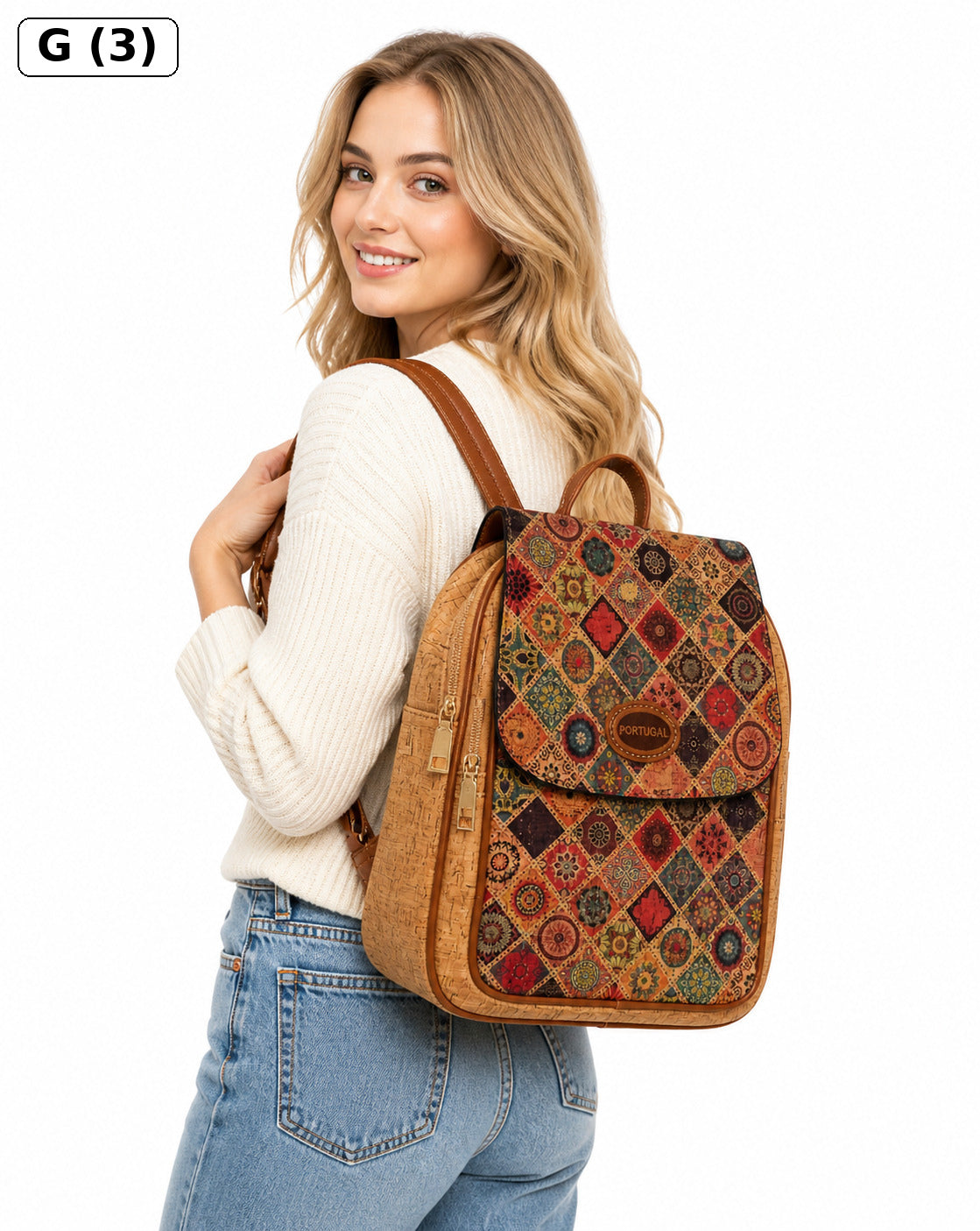 A woman carrying a patterned backpack with a brown leather trim. The backpack features a geometric diamond patchwork design in red, orange, green, and brown, with a brown leather flap and straps.